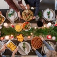 An aerial view of a holiday table filled with food